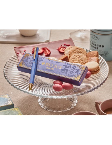 Boligrafo belius macaron bliss forma hexagonal color morado y dorado tinta azul caja de diseno